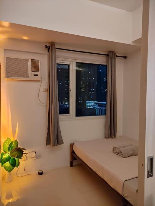 Апартаменты Cozynest In Makati Манила Экстерьер фото
